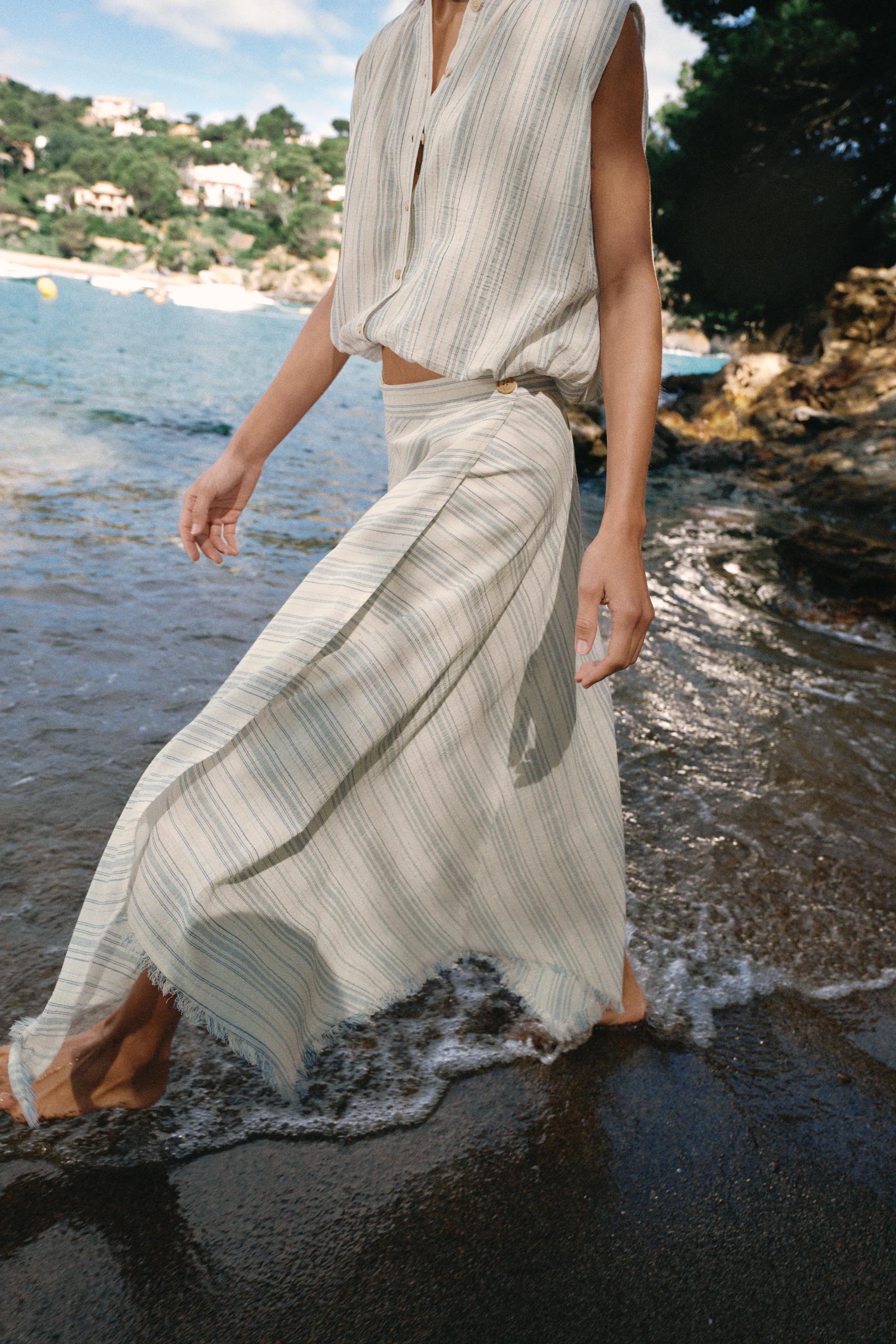 ASYMMETRIC MIDI SKIRT